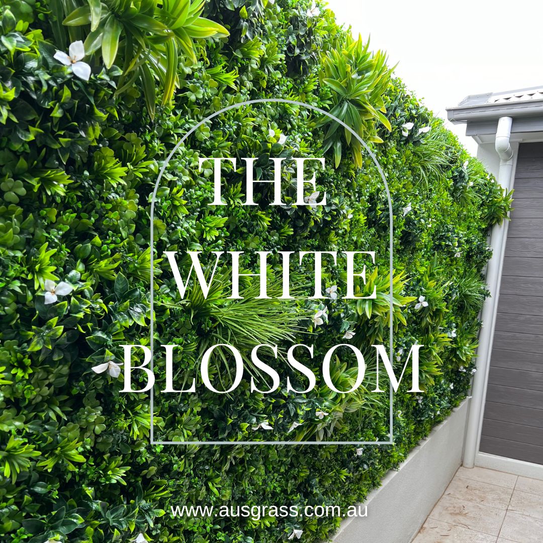green artificial garden wall jungle with white flowers