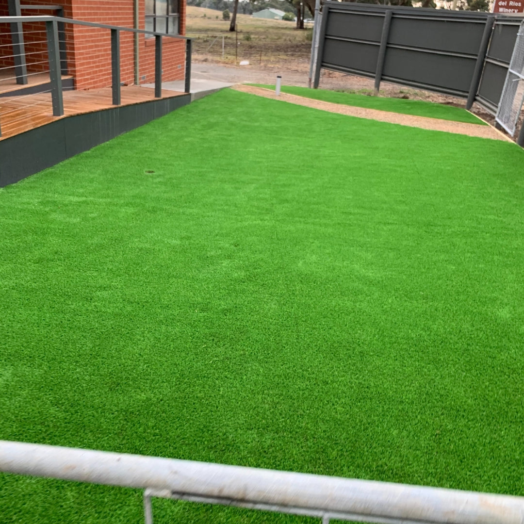 deluxe bright synthetic grass installation