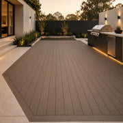 A large outdoor patio deck made of brown composite wood