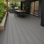 extra wide black composite deck backyard design