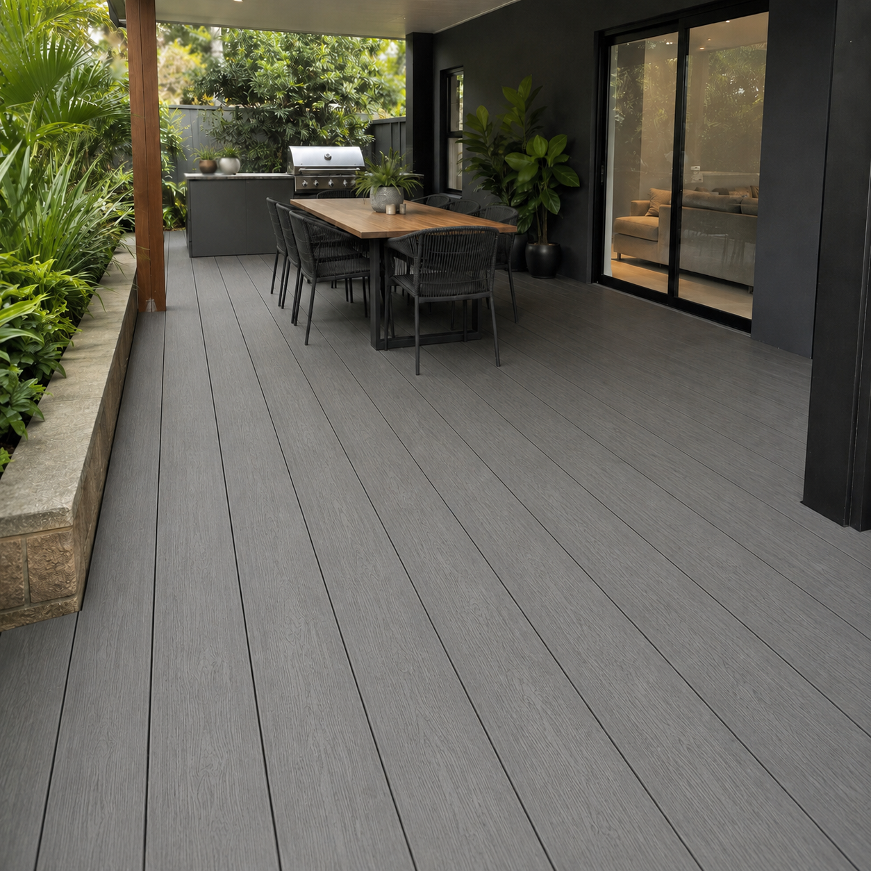 extra wide black composite deck backyard design